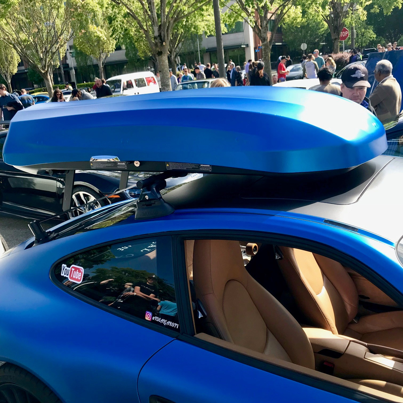This is a really ugly roof box on an otherwise only moderately ugly wrapped Porsche.